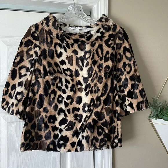 Trina Turk Faux Leopard Roll-Neck 1/2-Sleeve Top - Picture 1 of 7